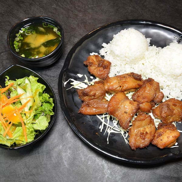 Daiichi Ramen's chicken teriyaki plate with rice, a side salad, and miso soup.